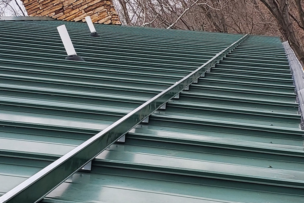 snow guard installation for metal roofs in west central illinois